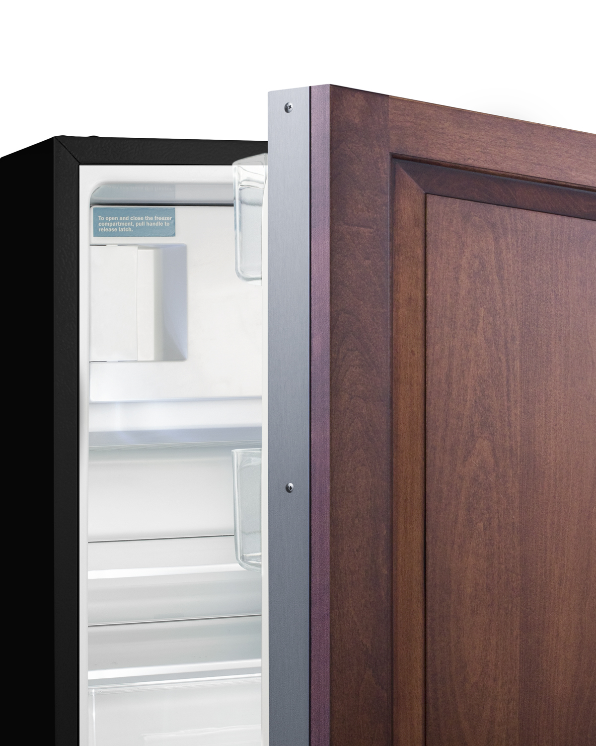 Built-in undercounter ADA compliant refrigerator-freezer in black with panel ready door for residential use, manual defrost with glass shelves, and door storage